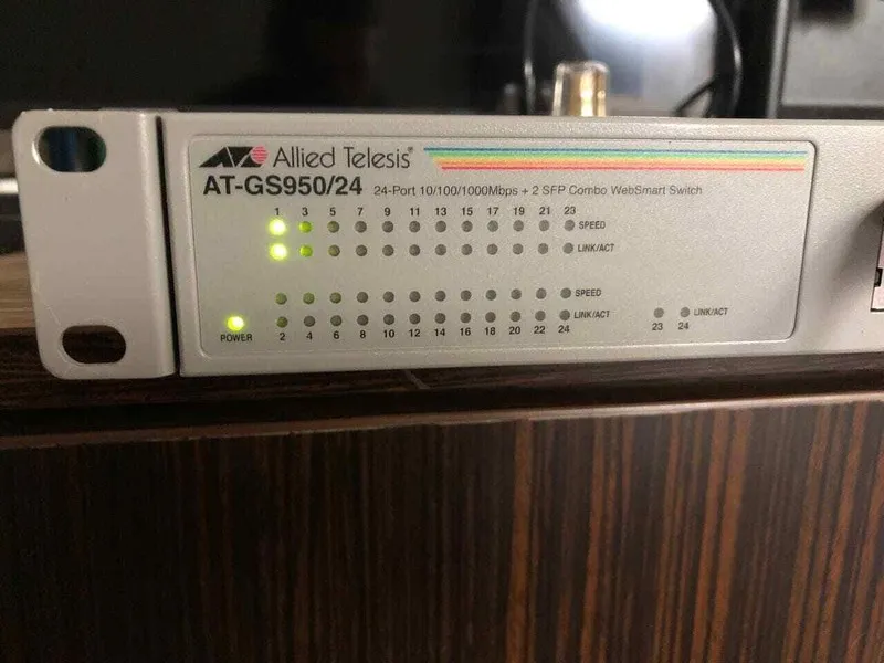 Коммутатор ALLIED TELESIS AT-GS950/24 24 PORT WEBSMART GIGABIT ETHERNET SWITCH — фото лота 1