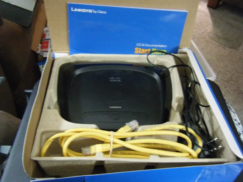 Маршрутизатор Linksys DIR-890L/R 54 Mbps 4-Port 10/100 Wireless G Router (WRT54G