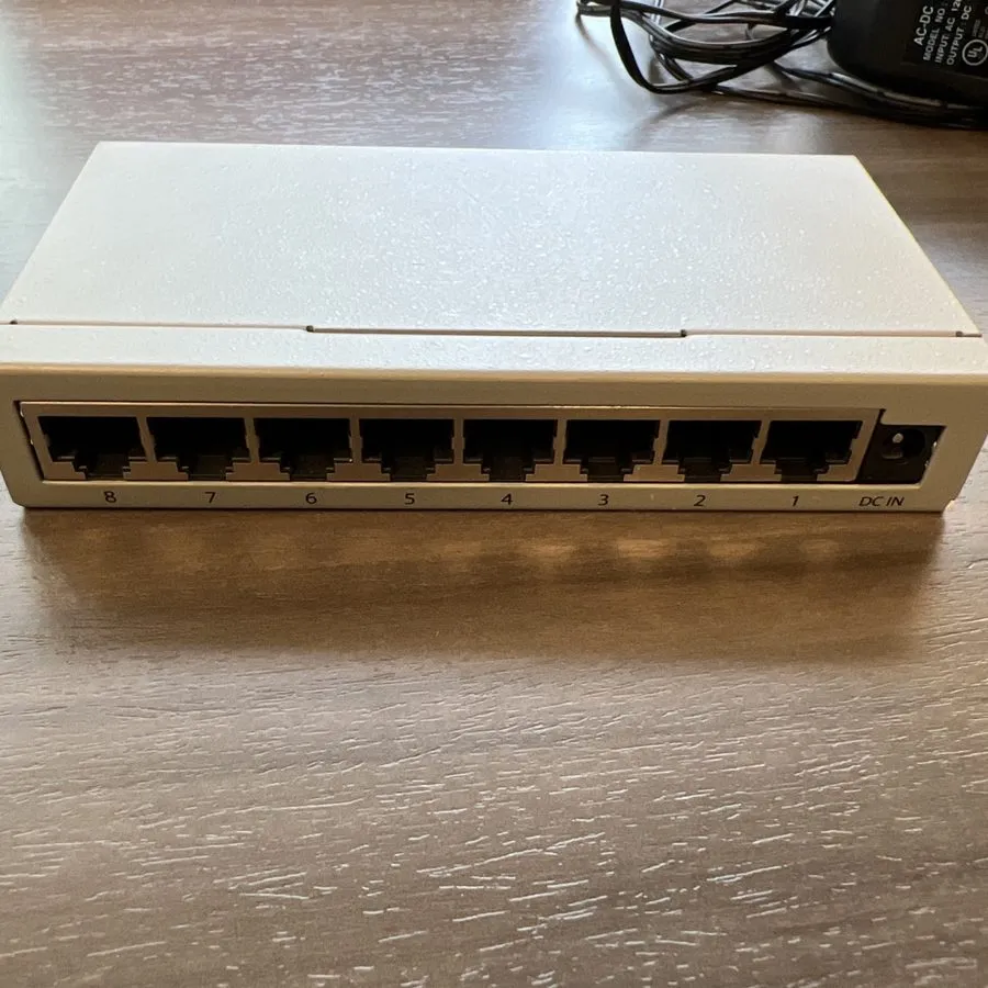 Коммутатор Allied Telesis AT-FS708LE-10 8 Port Ethernet Switch — фото лота 3
