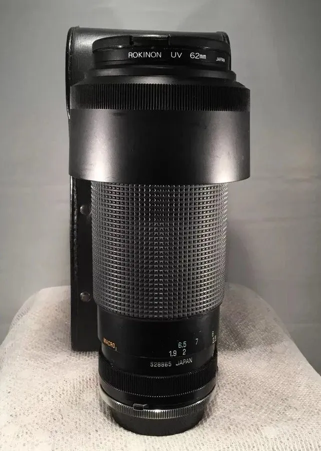 Объектив Tamron SP 60-300mm f/3.8-5.4 Lens with Case, UV Filter & Lens Hood — фото лота 1