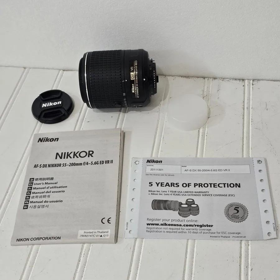 Объектив NIKON AF-S NIKKOR 55-200mm f4-5.6G ED DX VR IF LENS, CAPS, POUCH