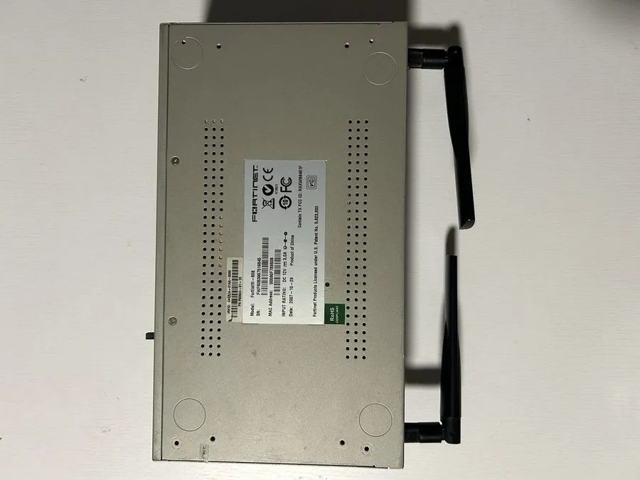 Межсетевой экран Fortinet FortiWiFi-60B FW-60B Network Security Firewall With An — фото лота 2