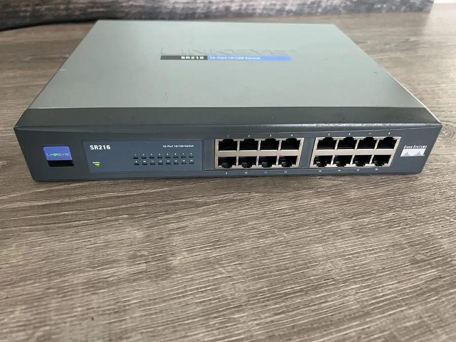 Коммутатор CISCO SYSTEMS SR216 LINKSYS 16 PORT 10/100 SWITCH 115 VAC