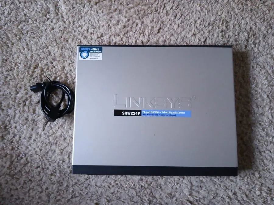 Коммутатор Cisco Linksys SRW224P 24-Port 10/100 Managed 2-Port Gigabit PoE Switc — фото лота 1