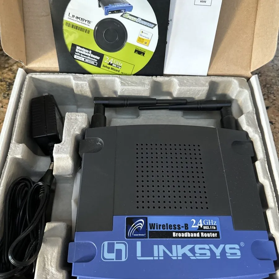 Маршрутизатор Linksys BEFW11S4 11 Mbps 4-Port 10/100 Wireless B Router — фото лота 2