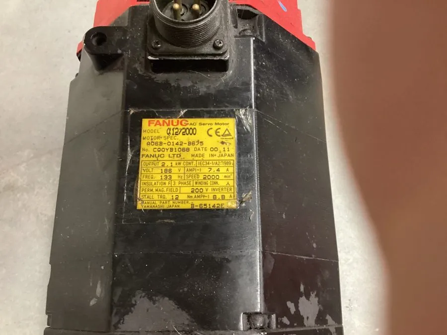 Серводвигатель Fanuc A06B-0142-B675 A12/2000 AC Servo Motor A64 2000 RPM 2.1KW 7
