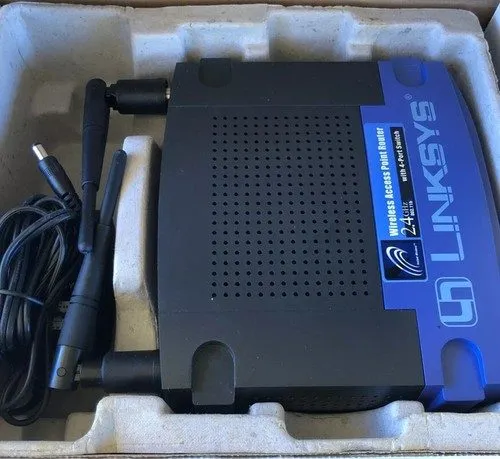 Маршрутизатор LINKSYS BEFW11S4 WIRELESS-B 2.4GHz 4-PORT BROADBAND ROUTER 802.11B
