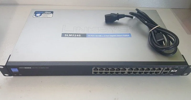Коммутатор Cisco Linksys SLM224G 24 Port 10/100 Managed Smart Switch(s) Tests Go