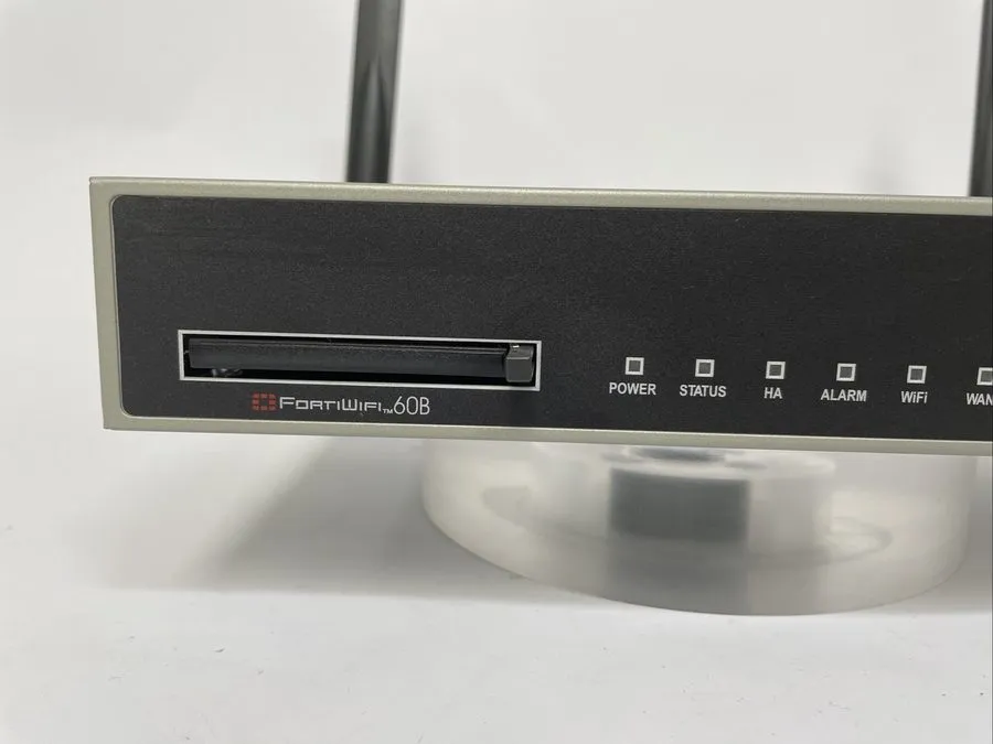Межсетевой экран Fortinet FortiWiFi-60B FW-60B Network Security Firewall With An — фото лота 1