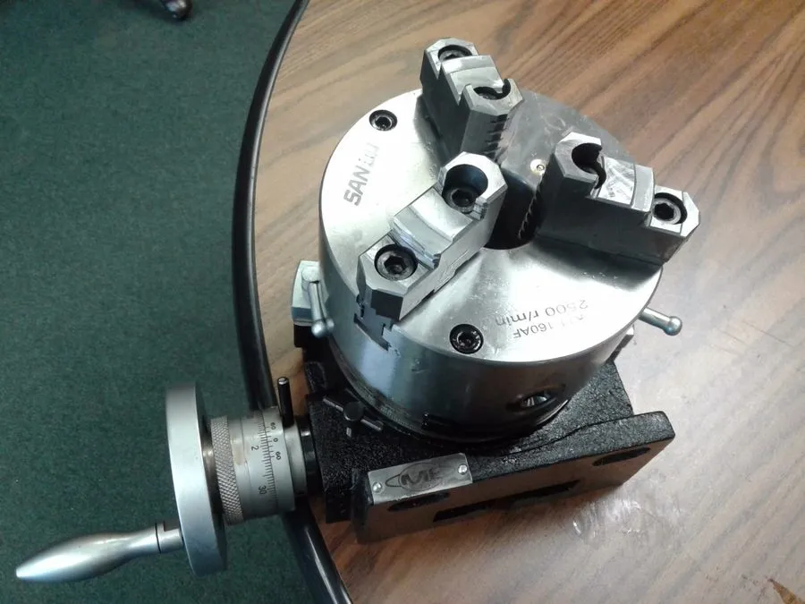 Поворотный стол 6" HORIZONTAL & VERTICAL ROTARY TABLE w. 6" 3-jaw chuck front mo — фото лота 1
