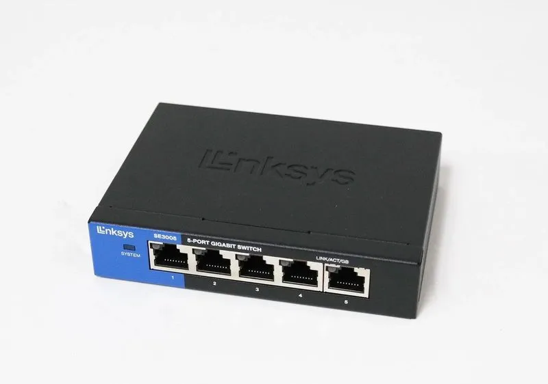Коммутатор Linksys 5-Port Gigabit Ethernet Switch Black/Blue SE3005v2 VG — фото лота 2