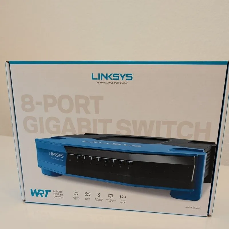 Коммутатор LINKSYS SE4008 WRT 8-Port Gigabit Switch