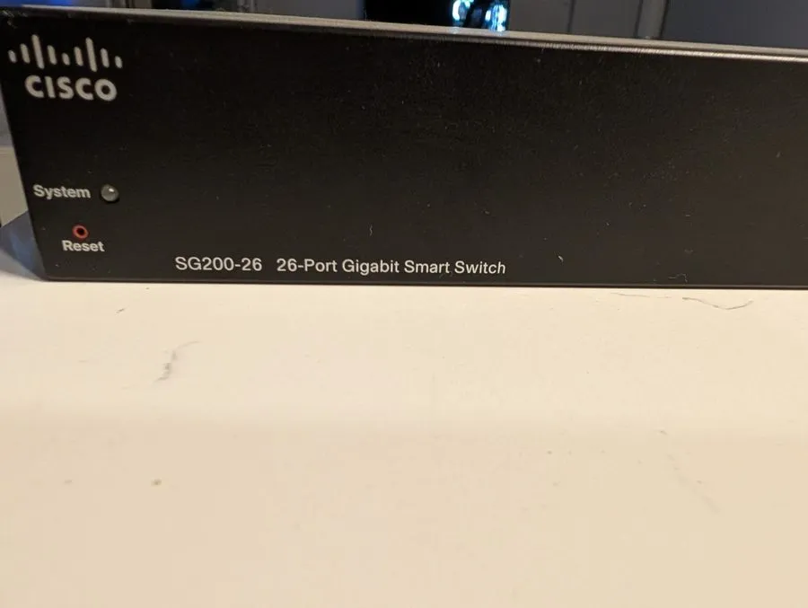Коммутатор Cisco SG200-26 26-Port Gigabit POE Smart Switch Works — фото лота 1