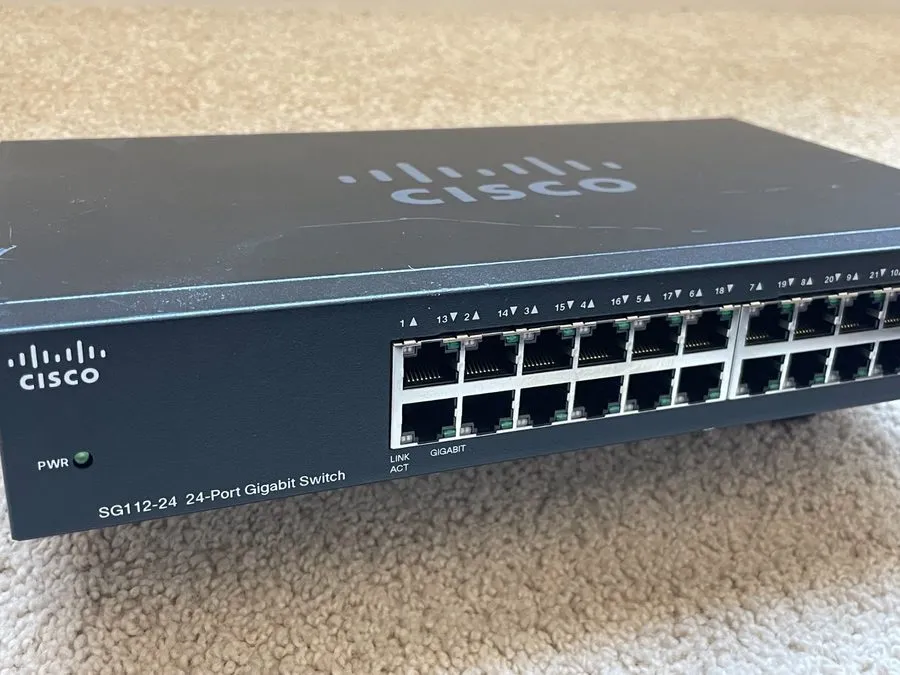 Коммутатор Cisco Compact 24-Port Gigabit Unmanaged Network Switch SG112-24