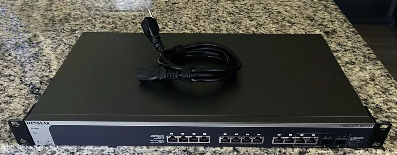 Коммутатор XS712T-100NES