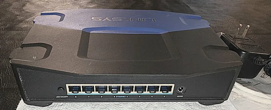 Коммутатор LINKSYS SE4008 WRT 8-Port Gigabit Switch