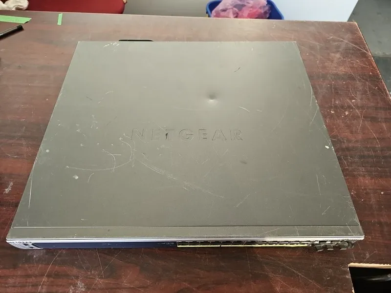 Коммутатор NetGear ProSafe GSM7228PS 24-Port Gigabit PoE Ethernet Switch — фото лота 1