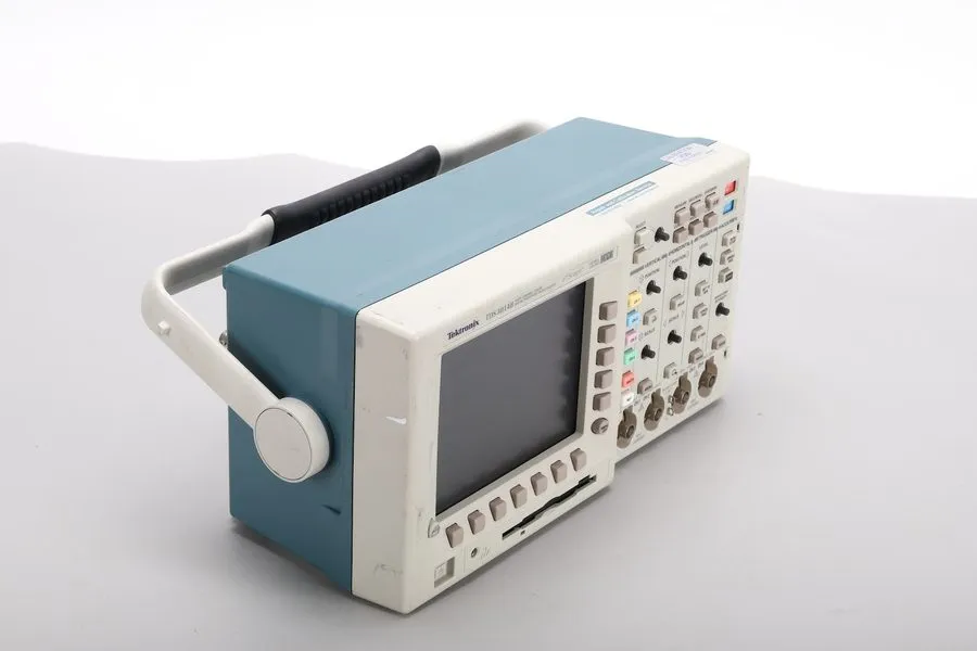 Тестер Tektronix TDS3014B 4-Channel 100MHz 1.25GS/s Digital Phosphor Oscillos — фото лота 1