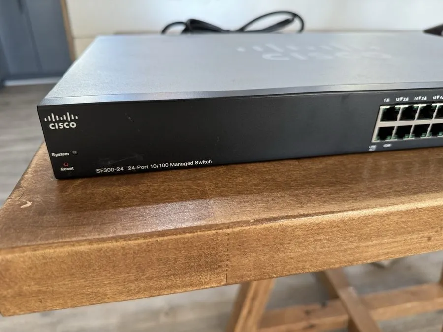 Коммутатор Cisco SF300-24PP 24-port Managed PoE+ Switch (no rackmount brackets)