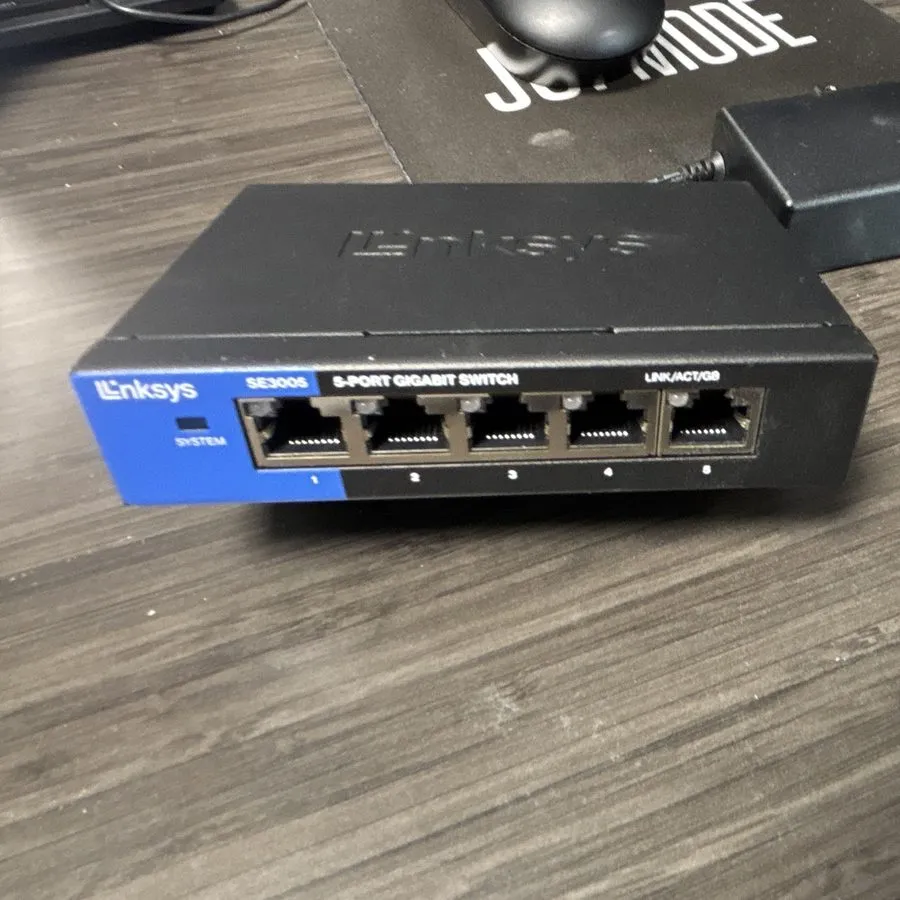 Коммутатор Linksys 5-Port Gigabit Ethernet Switch Black/Blue SE3005v2 VG