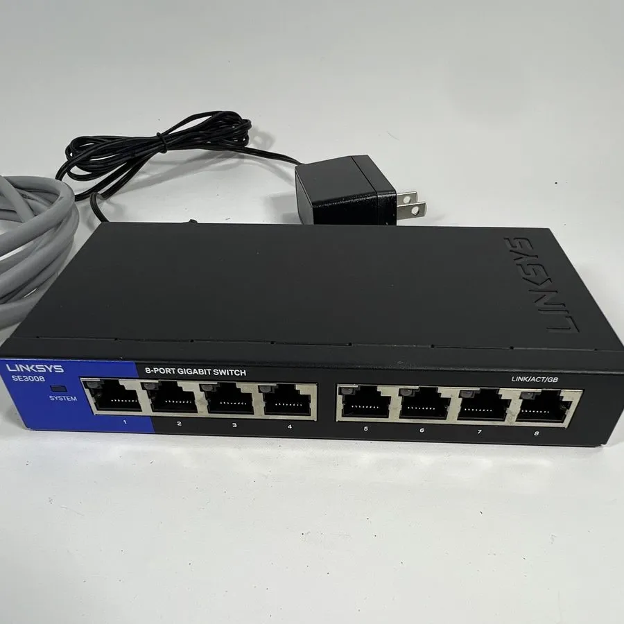 Коммутатор Linksys SE3008V2 8-Port Gigabit Ethernet Switch Black and Blue — фото лота 1