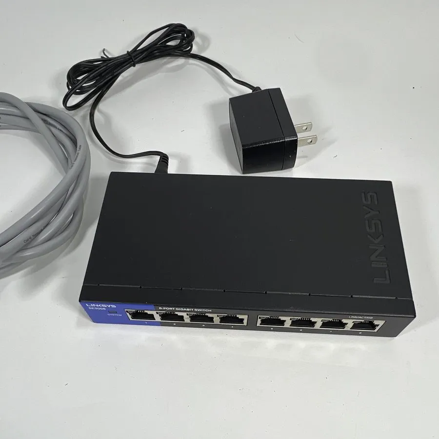 Коммутатор Linksys SE3008V2 8-Port Gigabit Ethernet Switch Black and Blue — фото лота 2