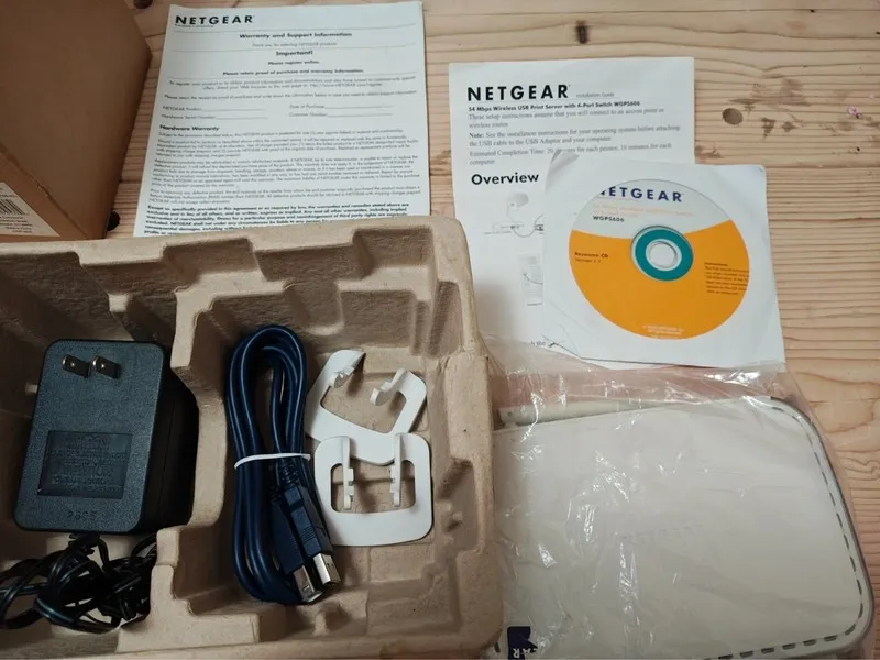 Оргтехника NETGEAR WGPS606 54 Mbps Wireless Print Server w/ 4-Port Switch