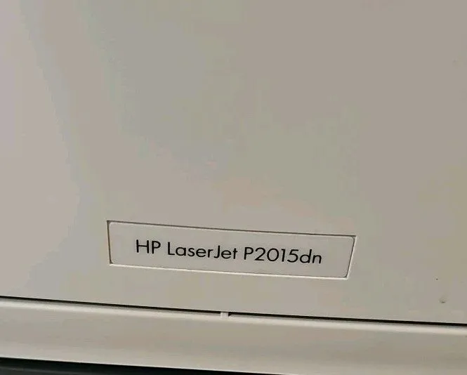 Лазерный принтер HP LaserJet P2015DN Workgroup Laser Printer Duplex 49,857 Pages — фото лота 1