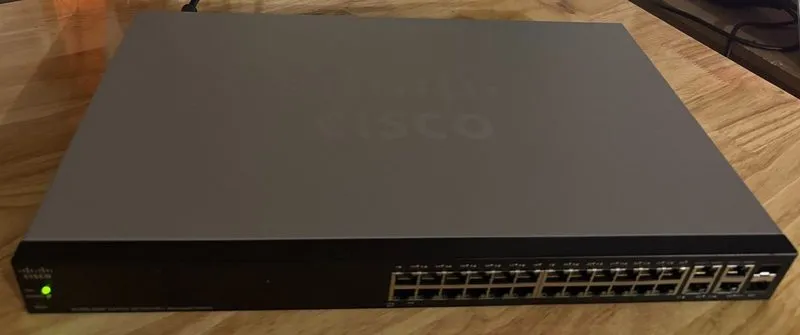 Коммутатор Cisco SF300-24PP 24-port Managed PoE+ Switch (no rackmount brackets) — фото лота 1