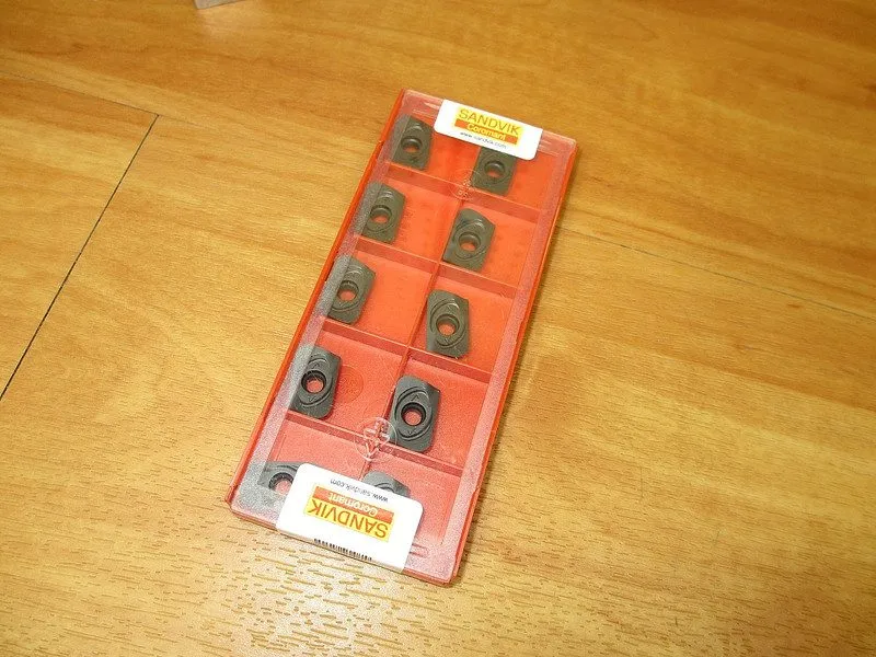 Режущий инструмент Sandvik Coromant Carbide Milling Insert R390-18 06 40H-PL 102