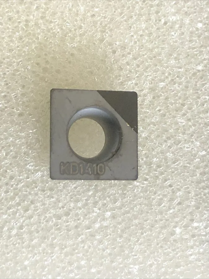 Режущий инструмент Kennametal SPGT3251 KD1410 PCD Tipped Carbide Insert. SPGT09T — фото лота 1