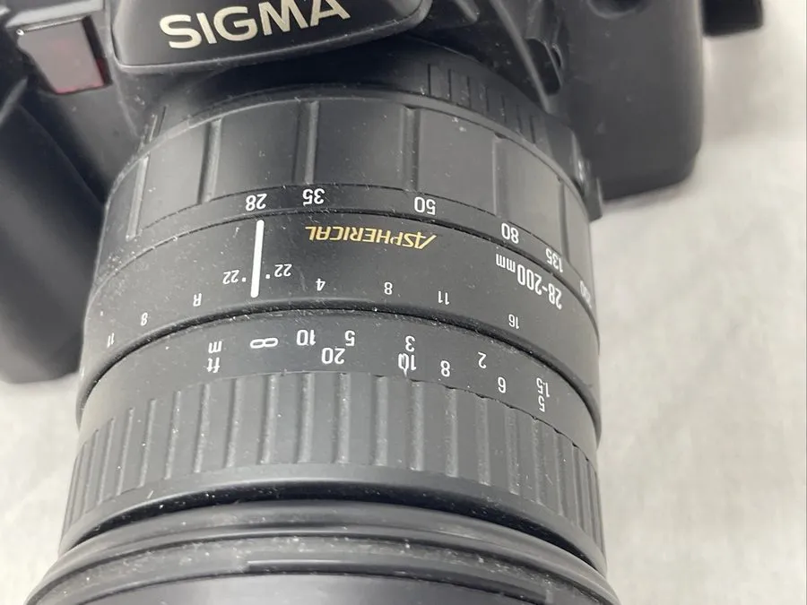 Объектив Sigma SA-5 Camera & Lens Bundle SIGMA Zoom 28-200mm Lens EF-430 Flash — фото лота 2