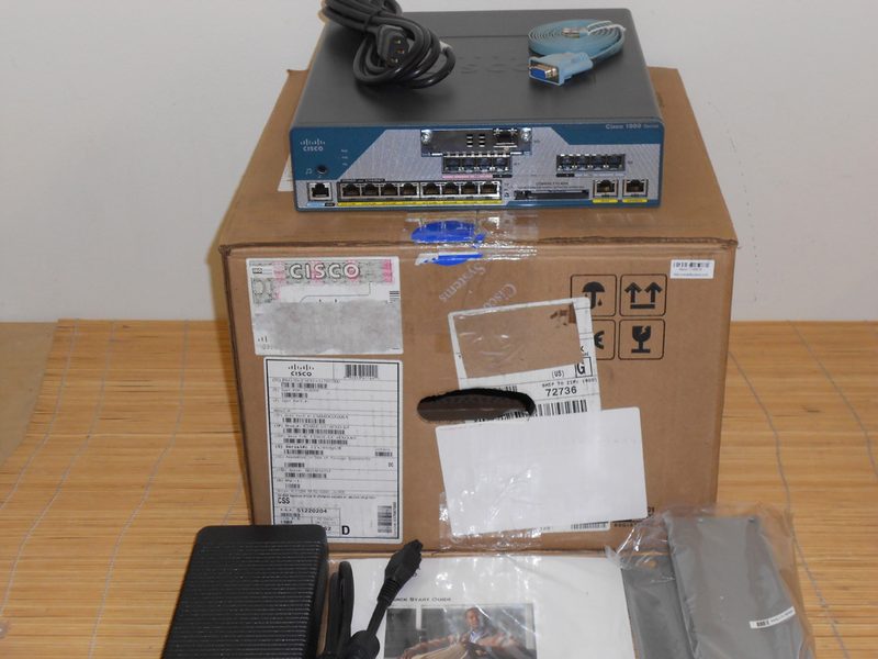 Маршрутизатор Cisco C1861E-UC-4FXO-K9