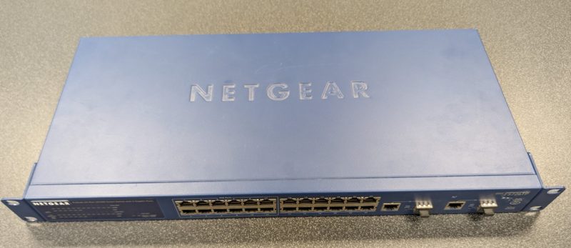 Коммутатор Netgear FS726TP